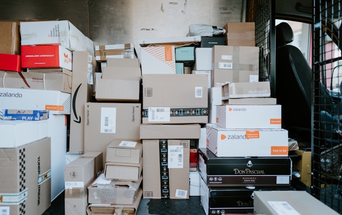 door to door international courier in Ernakulam — delivery van with parcels